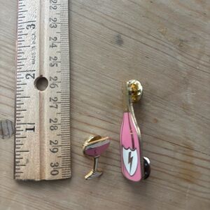 Pink and gold champagne bottle and coupe glass enamel pin